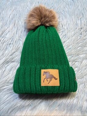 All Seated in a Barn Green Knit Pom Pom Beanie
